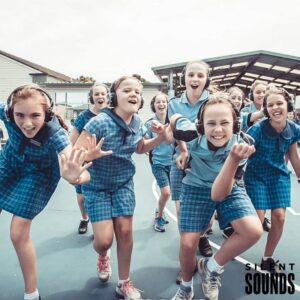 SILENT DISCO FOR SCHOOLS AND OSHC HIRE (4) A group of school children wearing Silent Sounds Headphones dancing at their school.